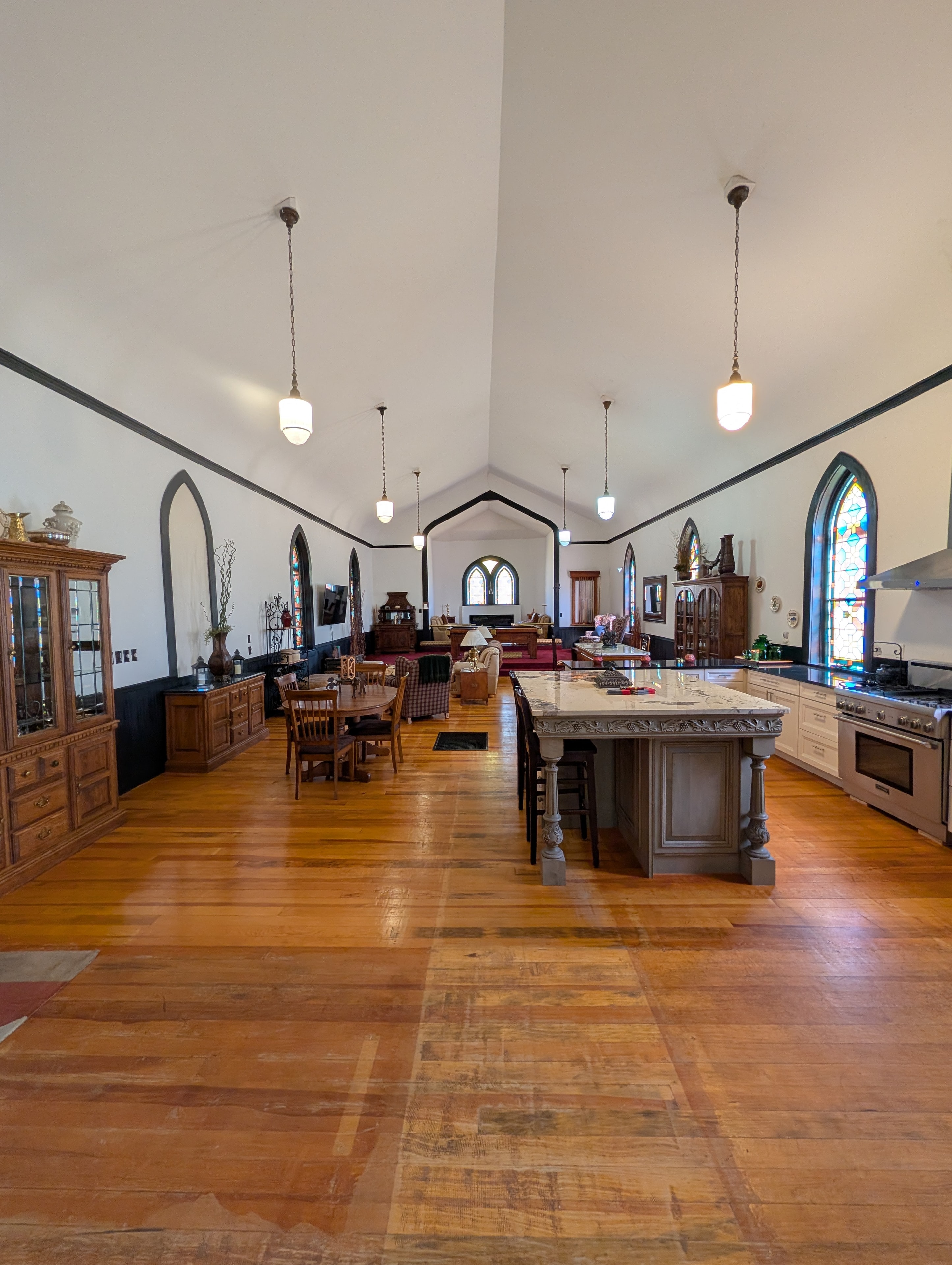 Chapel rear exterior with arched windows and parking