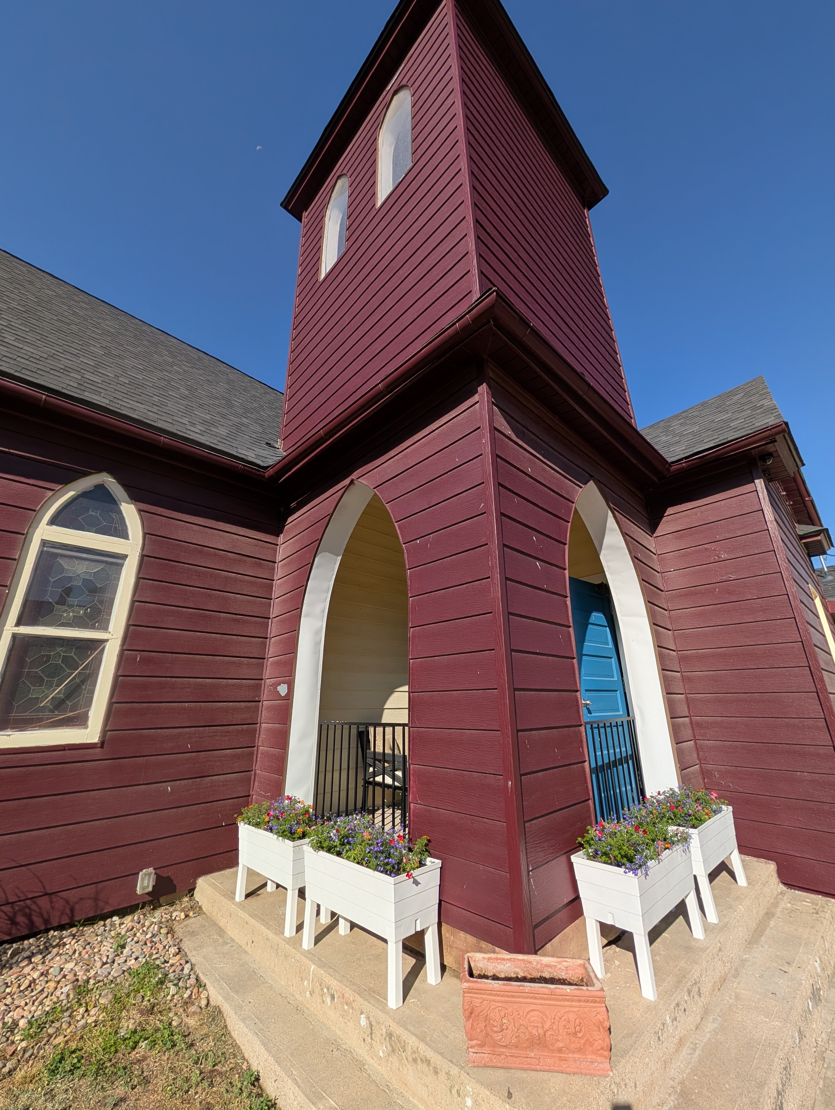 Stained glass windows with armchairs