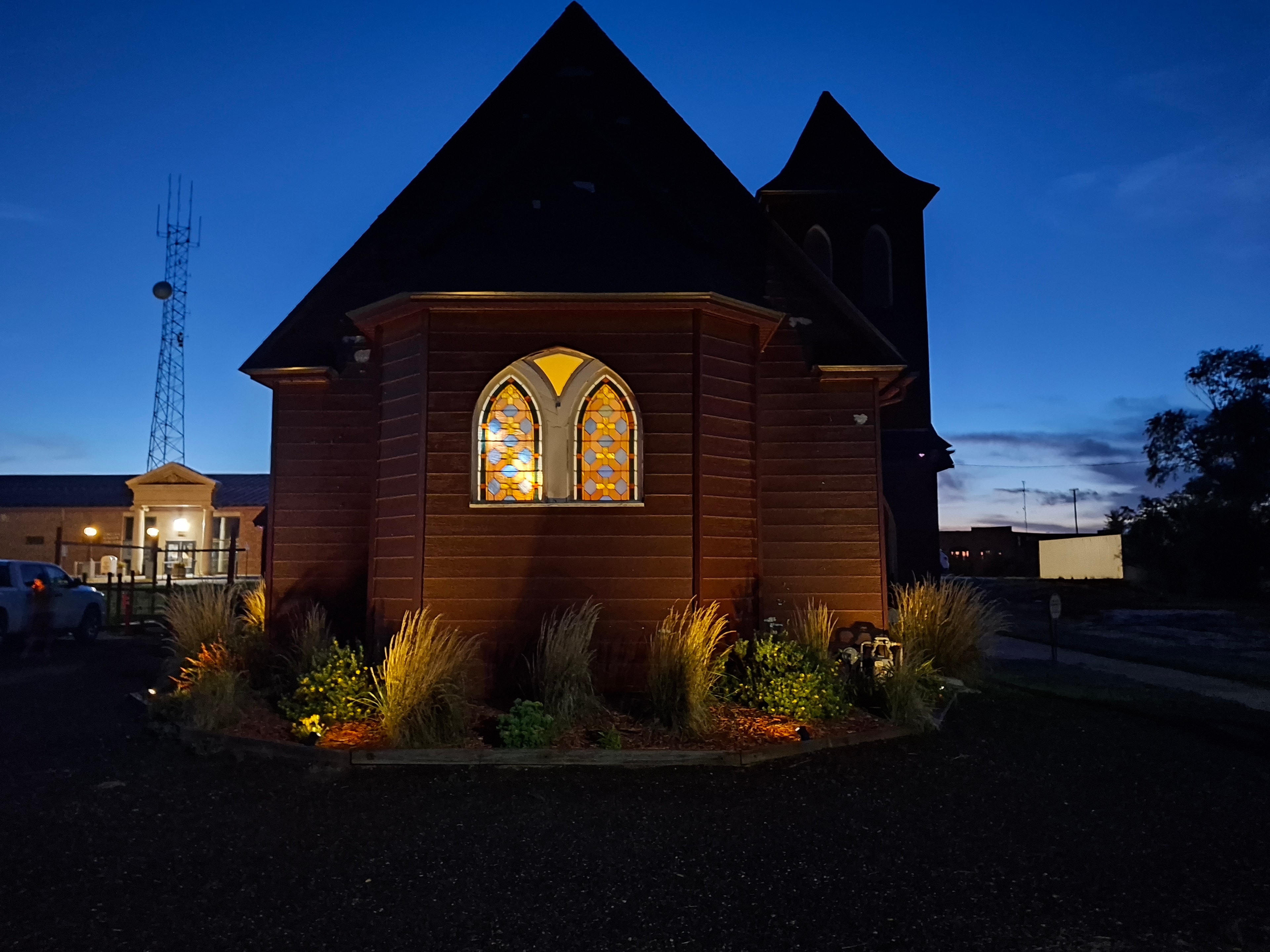 Chapel front view with steeple and arched windows